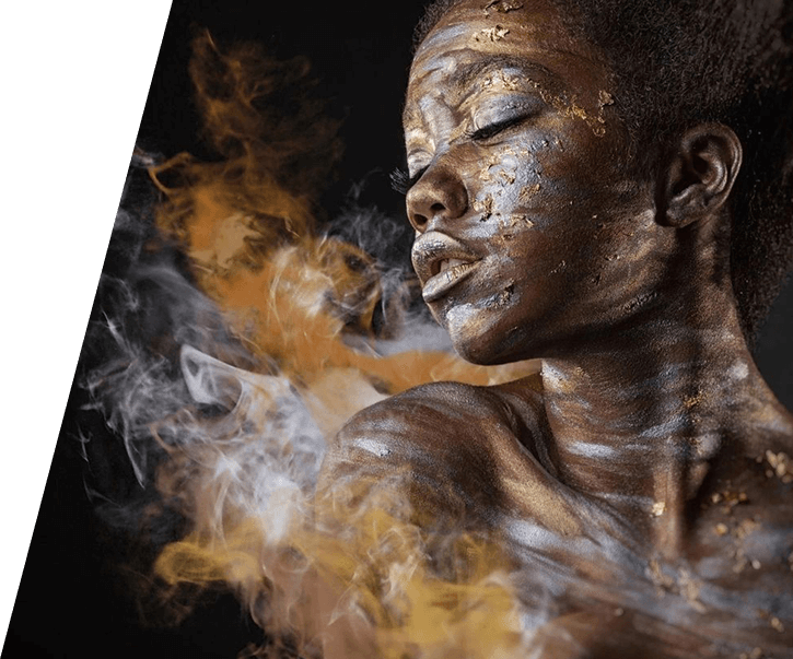 A man with his face covered in smoke.
